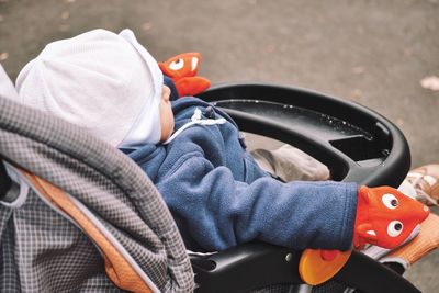 High angle view of baby in carriage