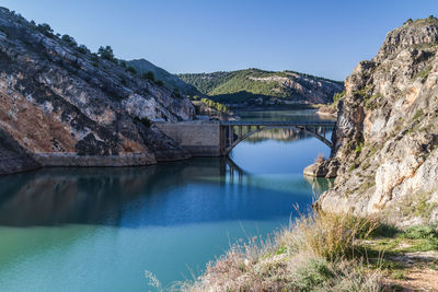 Scenic view of lake against blue sky