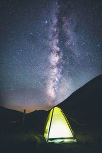 Tent against sky at night