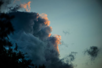 Low angle view of cloudy sky during sunset