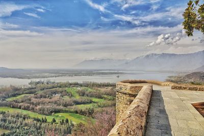 Panoramic view of landscape against cloudy sky