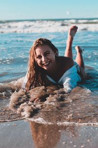 Portrait of a young woman in sea