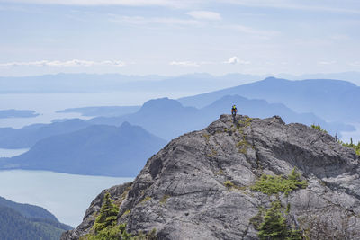 Man riding bicycle on rocks