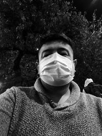 Portrait of young man wearing sunglasses outdoors