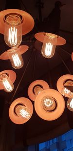 Low angle view of illuminated pendant light
