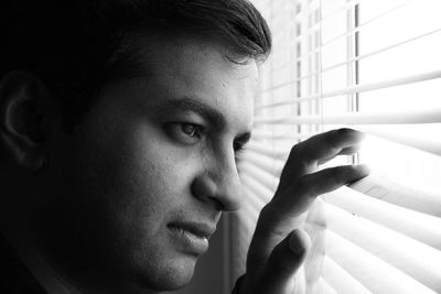 Portrait of young man looking away