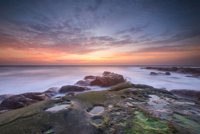 Scenic view of sea against sky during sunset