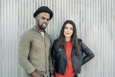 Young couple standing outdoors