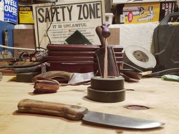 Close-up of old objects on table