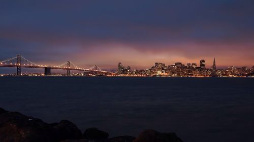 Bay bridge over san francisco bay at night