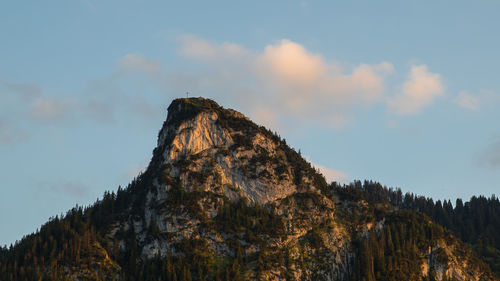 Low angle view of rocks against sky