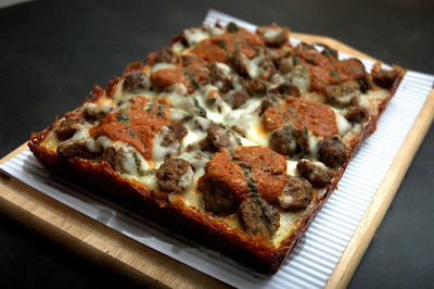 Close-up of pizza served in plate