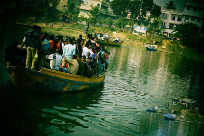 High angle view of people on boat in river