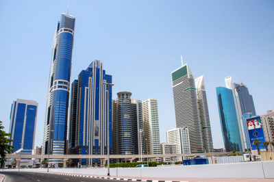 Low angle view of buildings against sky in city