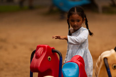 Girl playing at playground