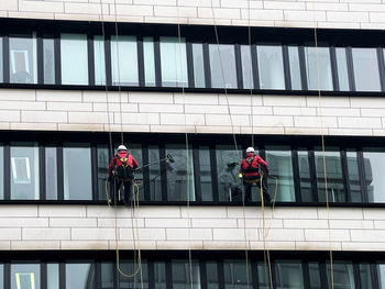 Window cleaners at work