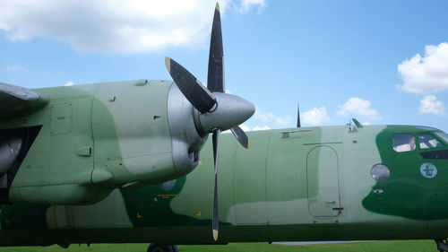 Low angle view of airplane against sky