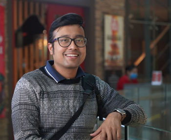 Portrait of smiling young man