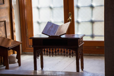 Low angle view of tables and chairs at home