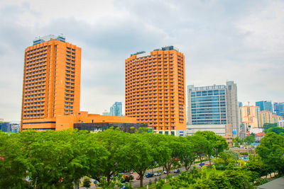 Modern cityscape against sky