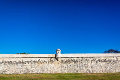 View of building against clear blue sky