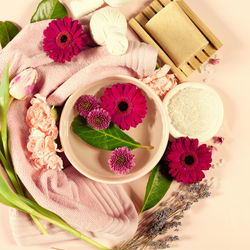 High angle view of pink roses on table