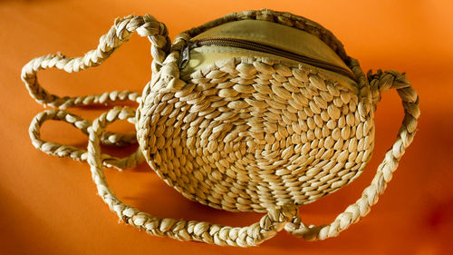 Close-up of wicker basket on table