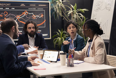 Business colleagues working on table