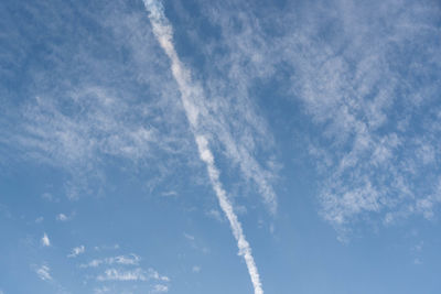 Low angle view of vapor trail in sky