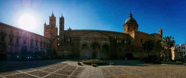 Panoramic view of palermo cathedral against clear sky on sunny day