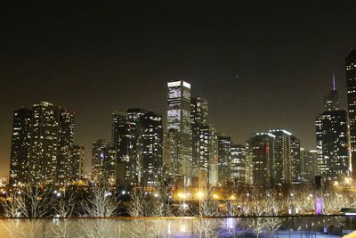 Illuminated cityscape at night