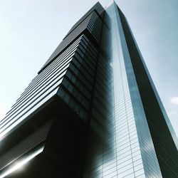 Low angle view of modern building against clear sky