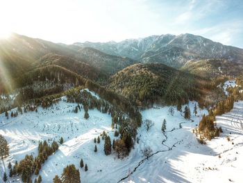 Scenic view of snowcapped mountains against sky