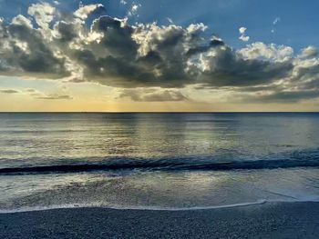 Scenic view of sea against sky during sunset