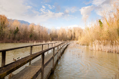 Scenic view of lake against sky during autumn