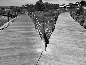 View of pier on footbridge