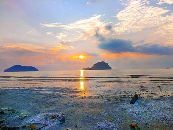 Scenic view of sea against sky during sunset