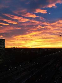 Scenic view of dramatic sky during sunset