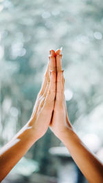 Close-up of hands holding water