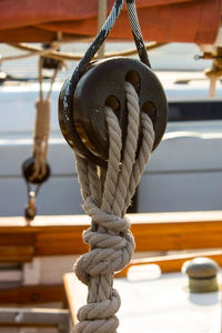 Close-up of rope tied to bollard