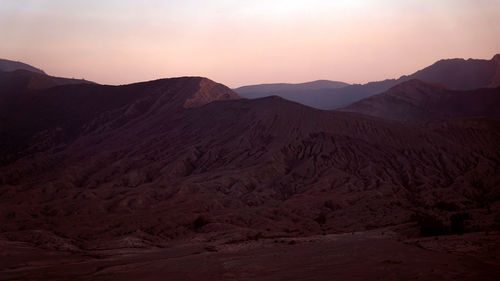 Scenic view of mountains against sky during sunset