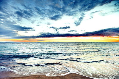 Scenic view of sea against sky during sunset