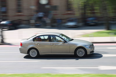 Side view of car on road