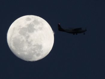 Low angle view of moon in sky