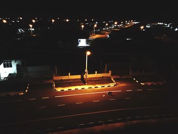 High angle view of illuminated city at night