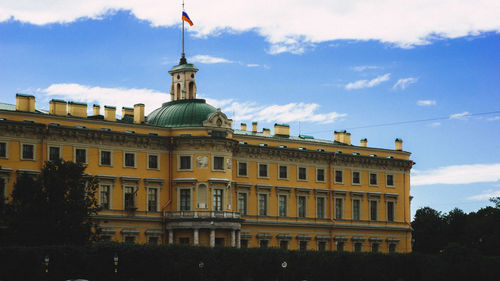 Building against cloudy sky