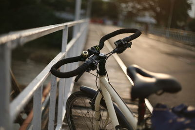 Close-up of bicycle on street