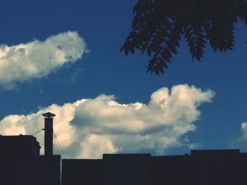 Low angle view of building against blue sky