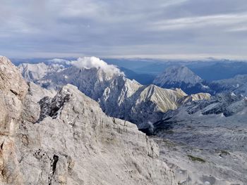 Scenic view of snowcapped mountains against sky