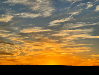 Scenic view of silhouette landscape against sky during sunset